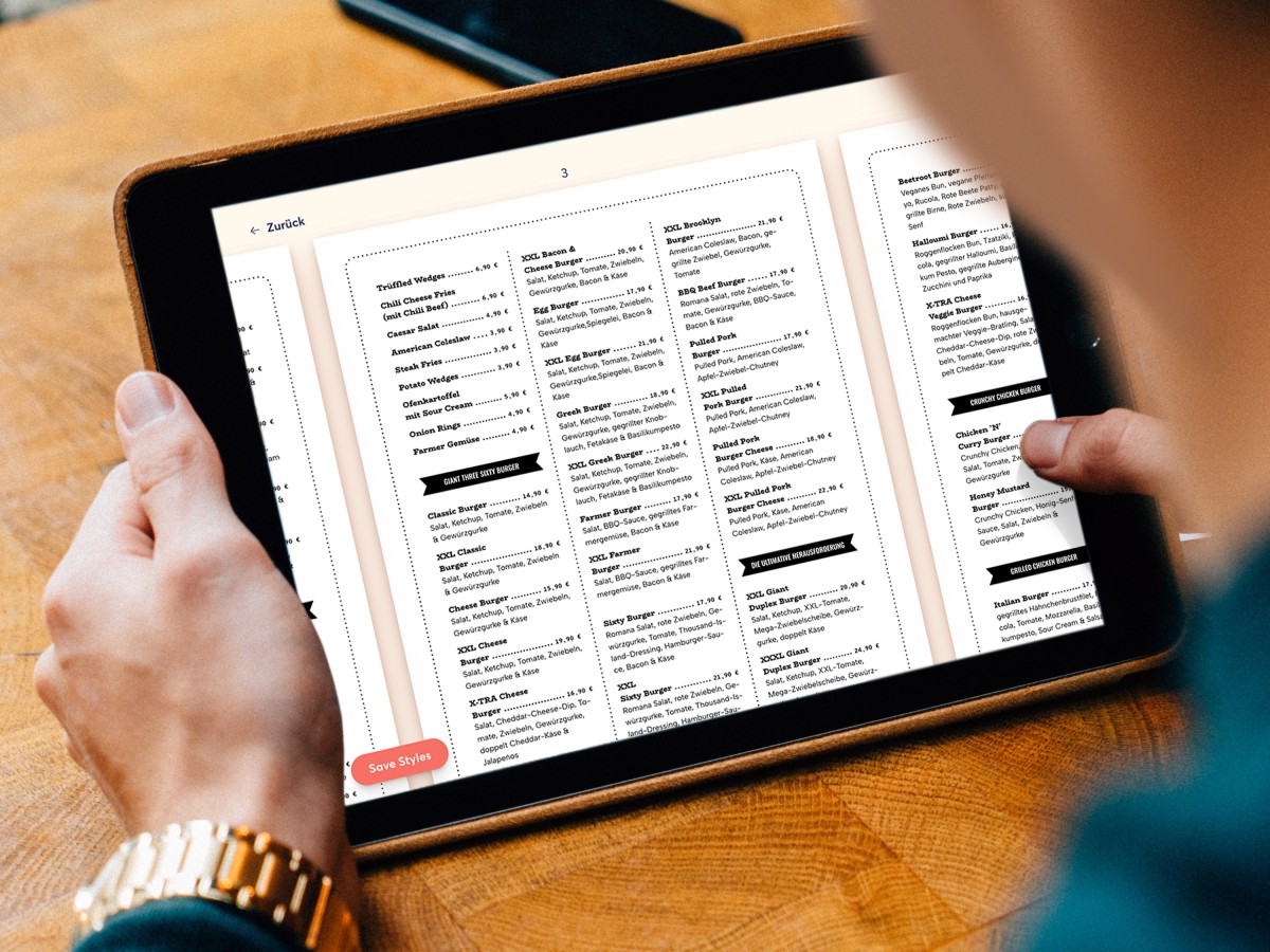 View over the shoulder of a person using the Tiramenu card editor on a tablet