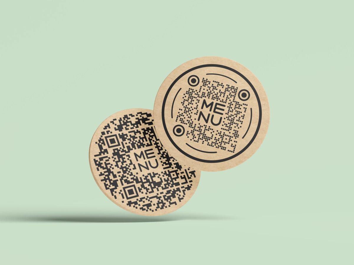Two beer mats with decorative QR codes